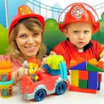 Mom and child play firefighters